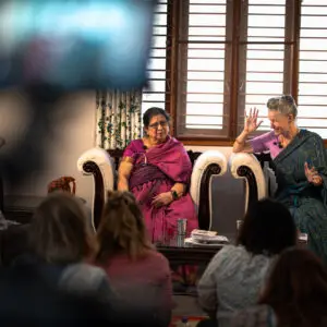 kiki flynn and dr jayashree on a sofa